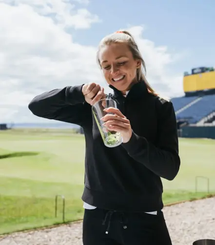 Hannah Davies preparing her "Game Changer" serve made with Ben Lomond Gin