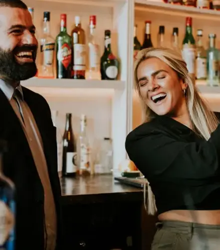 Just Jess Food shaking a cocktail shaker, demonstrating how to create the Ben Lomond Spritz with adventurous flair